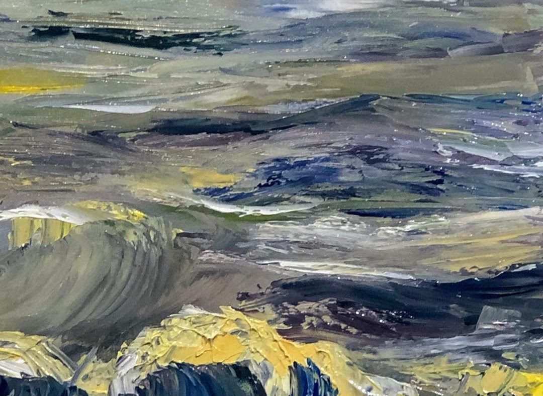 A churning grey and gold sea under a heavy sky