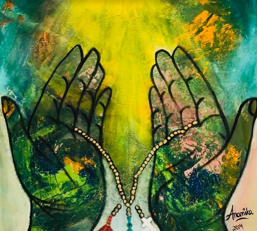 Two open hands painted in green and gold holding prayer beads, light pouring from above