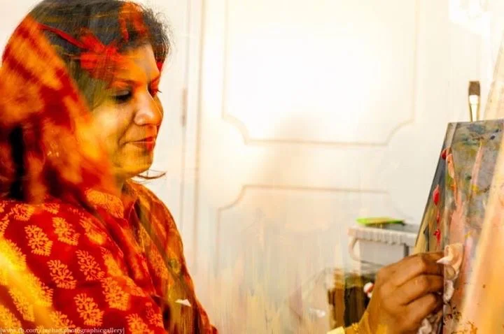 Anamika Nambiar painting at her easel